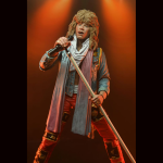 Bon Jovi es una banda estadounidense de rock formada en 1983 en Nueva Jersey por su líder y vocalista, Jon Bon Jovi. La formación actual la completan el teclista David Bryan, el batería Tico Torres, el bajista Hugh McDonald y el guitarrista Phil X. La banda debutó en 1984 con su álbum homónimo, cuyo sencillo «Runaway» fue el primero en entrar al Billboard Hot 100. Su segundo álbum, Slippery When Wet, publicado en 1986, fue un éxito comercial, alcanzando el número uno en el Billboard 200 y vendiendo más de 28 millones de copias en todo el mundo. El álbum incluyó los éxitos «You Give Love a Bad Name», «Livin' on a Prayer» y «Wanted Dead or Alive». Bon Jovi continuó cosechando éxitos en los años siguientes, publicando álbumes como New Jersey (1988), Keep the Faith (1992), These Days (1995) y Crush (2000). La banda ha vendido más de 130 millones de discos en todo el mundo, lo que la convierte en una de las bandas de rock más exitosas de todos los tiempos.