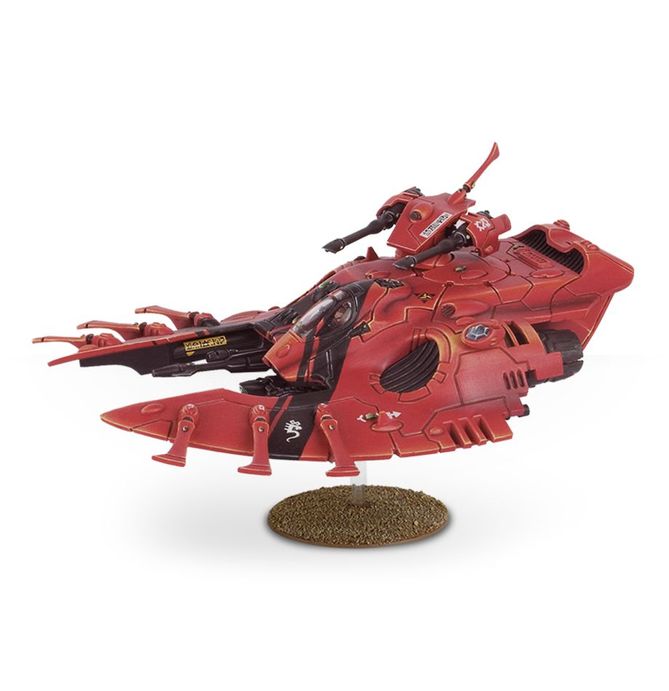 AELDARI: WAVE SERPENT (SERPIENTE) Las Serpientes son los principales vehículos para el transporte de tropas en el arsenal de los mundos astronave, y llevan guerreros a cualquier parte del campo de batalla a velocidades de vértigo. Los soldados a bordo están protegidos por un poderoso campo de energía y por el fuego de cobertura del potente arsenal de armas pesadas del vehículo.