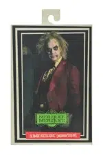 BEETLEJUICE RED TUXEDO SCALE ACTION NECA. De la secuela de la obra maestra de Tim Burton de 2024, Beetlejuice Beetlejuice, llega otro Ultimate Beetlejuice, luciendo su infame esmoquin de boda roja.  Treinta y seis años después, Beetlejuice está tramando una vez más para casarse con Lydia y finalmente escapar de la vida después de la vida.  Aparece en su icónico look para interrumpir la propia boda de Lydias e interpreta la clásica canción de 1968 "MacArthur Park", con la esperanza de ganarse finalmente sobre el amor de su vida y estar encerrado en el matrimonio eterno.  Esta escala de 7 pulgadas, figura de acción totalmente articulada incluye placas y manos intercambiables, corazón, maldito Baby Beetlejuice, y el contrato de matrimonio firmado por Lydia.  Viene en el embalaje de window-box con abertura frontal, perfecto para su colección de horror. Dile su nombre tres veces y trae a este increíble NECA Ultimate a casa, a casa, a casa