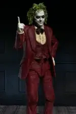 BEETLEJUICE RED TUXEDO SCALE ACTION NECA. De la secuela de la obra maestra de Tim Burton de 2024, Beetlejuice Beetlejuice, llega otro Ultimate Beetlejuice, luciendo su infame esmoquin de boda roja.  Treinta y seis años después, Beetlejuice está tramando una vez más para casarse con Lydia y finalmente escapar de la vida después de la vida.  Aparece en su icónico look para interrumpir la propia boda de Lydias e interpreta la clásica canción de 1968 "MacArthur Park", con la esperanza de ganarse finalmente sobre el amor de su vida y estar encerrado en el matrimonio eterno.  Esta escala de 7 pulgadas, figura de acción totalmente articulada incluye placas y manos intercambiables, corazón, maldito Baby Beetlejuice, y el contrato de matrimonio firmado por Lydia.  Viene en el embalaje de window-box con abertura frontal, perfecto para su colección de horror. Dile su nombre tres veces y trae a este increíble NECA Ultimate a casa, a casa, a casa