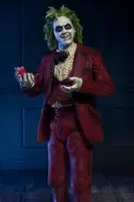 BEETLEJUICE RED TUXEDO SCALE ACTION NECA. De la secuela de la obra maestra de Tim Burton de 2024, Beetlejuice Beetlejuice, llega otro Ultimate Beetlejuice, luciendo su infame esmoquin de boda roja.  Treinta y seis años después, Beetlejuice está tramando una vez más para casarse con Lydia y finalmente escapar de la vida después de la vida.  Aparece en su icónico look para interrumpir la propia boda de Lydias e interpreta la clásica canción de 1968 "MacArthur Park", con la esperanza de ganarse finalmente sobre el amor de su vida y estar encerrado en el matrimonio eterno.  Esta escala de 7 pulgadas, figura de acción totalmente articulada incluye placas y manos intercambiables, corazón, maldito Baby Beetlejuice, y el contrato de matrimonio firmado por Lydia.  Viene en el embalaje de window-box con abertura frontal, perfecto para su colección de horror. Dile su nombre tres veces y trae a este increíble NECA Ultimate a casa, a casa, a casa