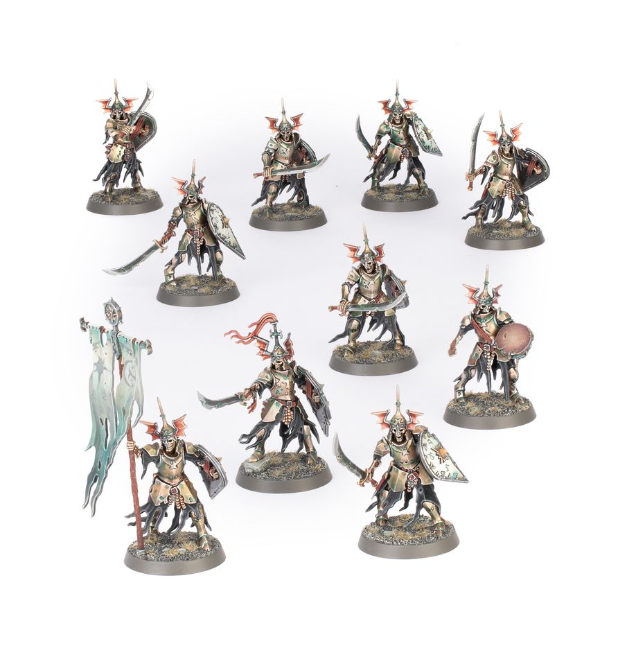 Souldlight gravelords: barrow guard. La guardia fúnebre es una camarilla de pretorianos, campeones y huscarles que acompañan a un rey tumulario y gozan de su favor. Son la infantería de élite de las legiones repicahuesos, imbuidos de recuerdos de juramentos de lealtad y servidumbre eterna. Algunos tienen predilección por la espada y escudo tradicionales de la escolta de un monarca, mientras que otros optan por enormes espadones a dos manos para partir en dos a sus enemigos.