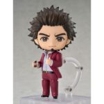 ICHIBAN KASUGA YAKUZA NENDOROID. Se incorpora a la colección Nendoroid de Good Smile Arts Shanghai la figura de 10 cm de Ichiban Kasuga, uno de los personajes principales de la saga de videojuegos "Yakuza" a partir de "Yakuza: Like a Dragon".  Contiene 3x placas faciales (cara sonriente, de batalla y contenta) y diversos accesorios: 1x bate de béisbol, 1x bebida energética, 1x smartphone, 1x base con soporte y otras partes opcionales para diferentes poses.  Puedes mostrarla junto a KAZUMA KIRYU FIGURA 10 CM YAKUZA NENDOROID (se vende por separado).