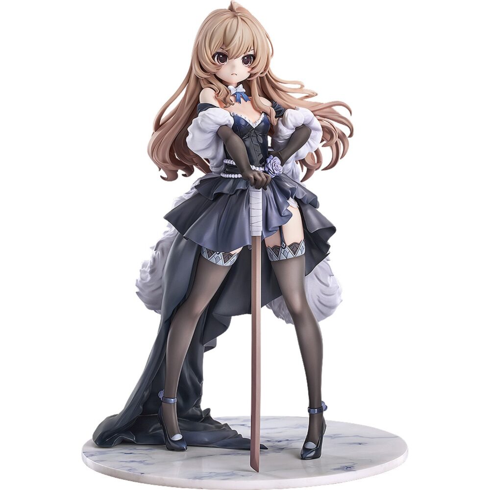 Taiga aisaka dress version toradora 1/7. Luminous box presenta la estatua a escala 1/7 de taiga aisaka dress version, inspirada en su personaje en el anime “toradora! ". Taiga aparece con un vestido voluminoso y elegante, una espada de madera en mano y una base circular que se asemeja al mármol. Decorada con perlas y detalles en púrpura. Mide aproximadamente 23 cm de alto y está fabricada en pvc.