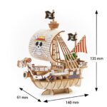 GOING MERRY SET MONTAJE 15,5 CM ONE PIECE WA-GU-MI WOODEN ART. Construye el Going Merry, el primer barco de los Piratas de Sombrero de Paja de "One Piece", y homenajea sus humildes comienzos con este set de montaje de la línea wa-gu-mi Wooden Art de Kito Art. El set está compuesto por 88 piezas de madera contrachapada precortadas por láser y pintadas, distribuidas en 3 paneles de 17x13 cm. Una vez encajadas todas las piezas, el barco tiene unas medidas de 15,5 x 14 x 6 cm. Incluye manual de instrucciones. Se presenta en una caja con ranura para colgar.