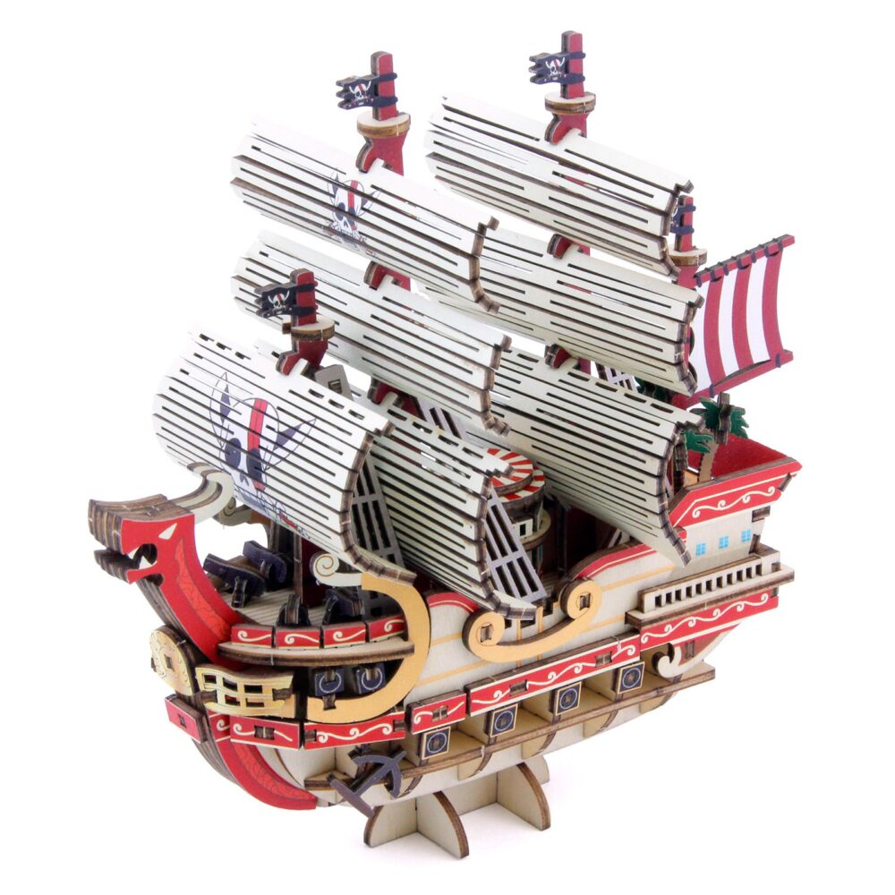 RED FORCE SET MONTAJE ONE PIECE WA-GU-MI WOODEN ART. El Red Force, legendario navío de los Piratas del Pelirrojo cuyo capitán es Shanks, se erige como símbolo de fuerza y lealtad con este set de montaje. Una vez montado tiene unas medidas de 14 x 14 x 7 cm y está basado en su aparición en el anime "One Piece". El set de la colección wa-gu-mi Wooden Art de Kito Art está formado por 183 piezas de madera contrachapada precortadas por láser y pintadas, distribuidas en 4 paneles de 17 x 13 cm. Incluye manual de instrucciones. Se presenta en una caja con ranura para colgar en el punto de venta.
