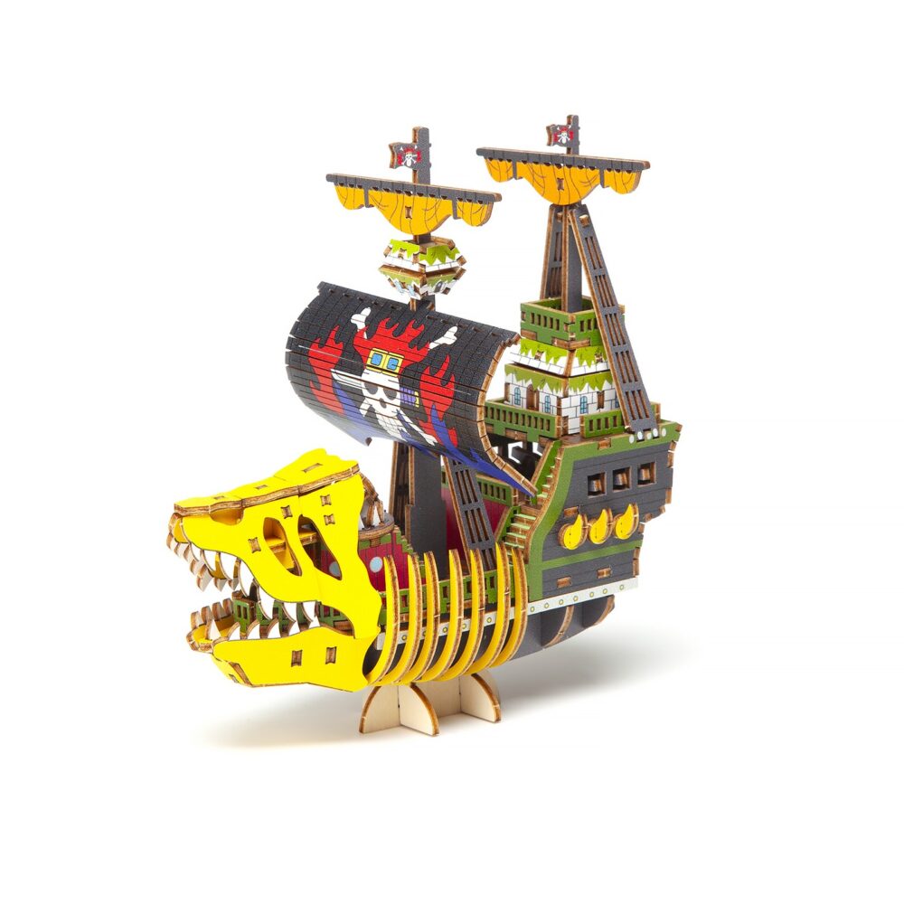 VICTORIA PUNK SET MONTAJE ONE PIECE WA-GU-MI WOODEN ART. Kito Art presenta, dentro de la colección wa-gu-mi Wooden Art, este set de montaje del barco de los Piratas de Kid, el Victoria Punk. Una vez montado tiene unas medidas de 13,5 x 12,5 x 7 cm y está basado en su aspecto en el anime "One Piece". El set está formado por 188 piezas de madera contrachapada precortadas por láster y pintadas, distribuidas en 4 paneles de 17 x 13 cm. I ncluye manual de instrucciones. Se presenta en una caja con ranura para colgar en el punto de venta.