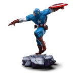 CAPTAIN AMERICA MARVEL ART SCALE 1/10 . Descubre la impresionante estatua de Captain America, parte de la exclusiva colección de Iron Studios. Esta figura a escala 1/10 captura al icónico superhéroe en una posición dinámica, destacando su pose de ataque con su característico escudo en alto. Con una altura aproximada de 22 cm, está fabricada en resistente poliresina, asegurando una gran durabilidad y detalles sorprendentes. Los colores vibrantes en azul, rojo y blanco realzan el diseño clásico del traje de Captain America, con detalles que incluyen texturas realistas en la vestimenta y una base que imita terreno rocoso, añadiendo un toque dramático a la figura. Es una pieza licenciada oficialmente, perfecta para los verdaderos entusiastas de Marvel y los coleccionistas de Avengers.