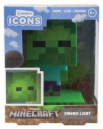 MINECRAFT LÁMPARA 3D ICON ZOMBIE. Con esta exclusiva lámpara de mesilla de la marca Paladone para su línea Icons tus noches serán mucho más pixeladas que de costumbre. La lamparita de 12 cms viene sobre una peana que parece césped de Minecraft. El pixelado cuerpo del zombie se iluminará y te acompañará cuando te desveles, pero recuerda, funciona con dos pilas AAA 1.5V no incluidas. Viene en una caja temática con ventana para que la colecciones junto a las otras lámparas de la colección: Álex, Steve y Creeper. Está hecho de plástico y es un producto de licencia oficial de Minecraft.