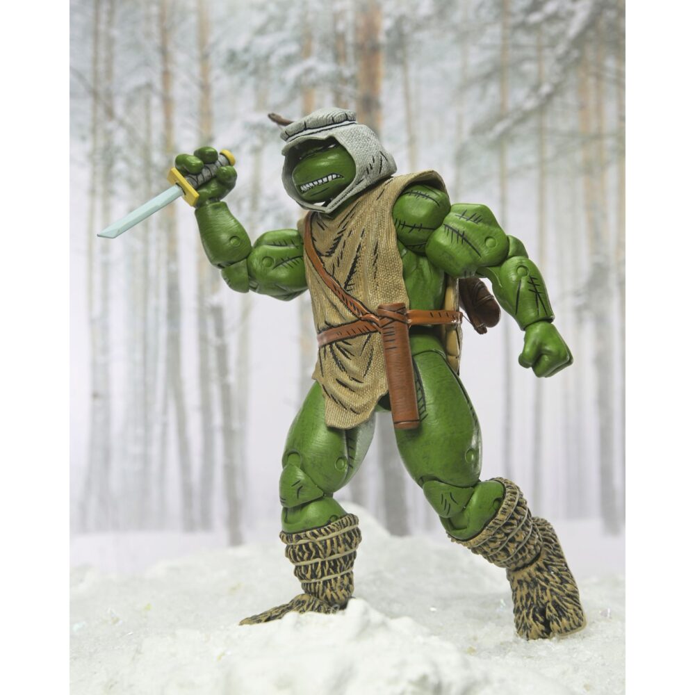 Hunter leo teenage mutant ninja turtles mirage comics. Neca presenta la figura articulada hunter leo basada en los cómics originales de "teenage mutant ninja turtles"  de mirage studios. Esta figura mide 18 cm e incluye 1x arco, 1x carcaj para sus armas, 3x flechas, 1x espada, 4x manos intercambiables y 1x cuchillo. Se presenta en una caja con ventana con ilustraciones de kevin eastman.