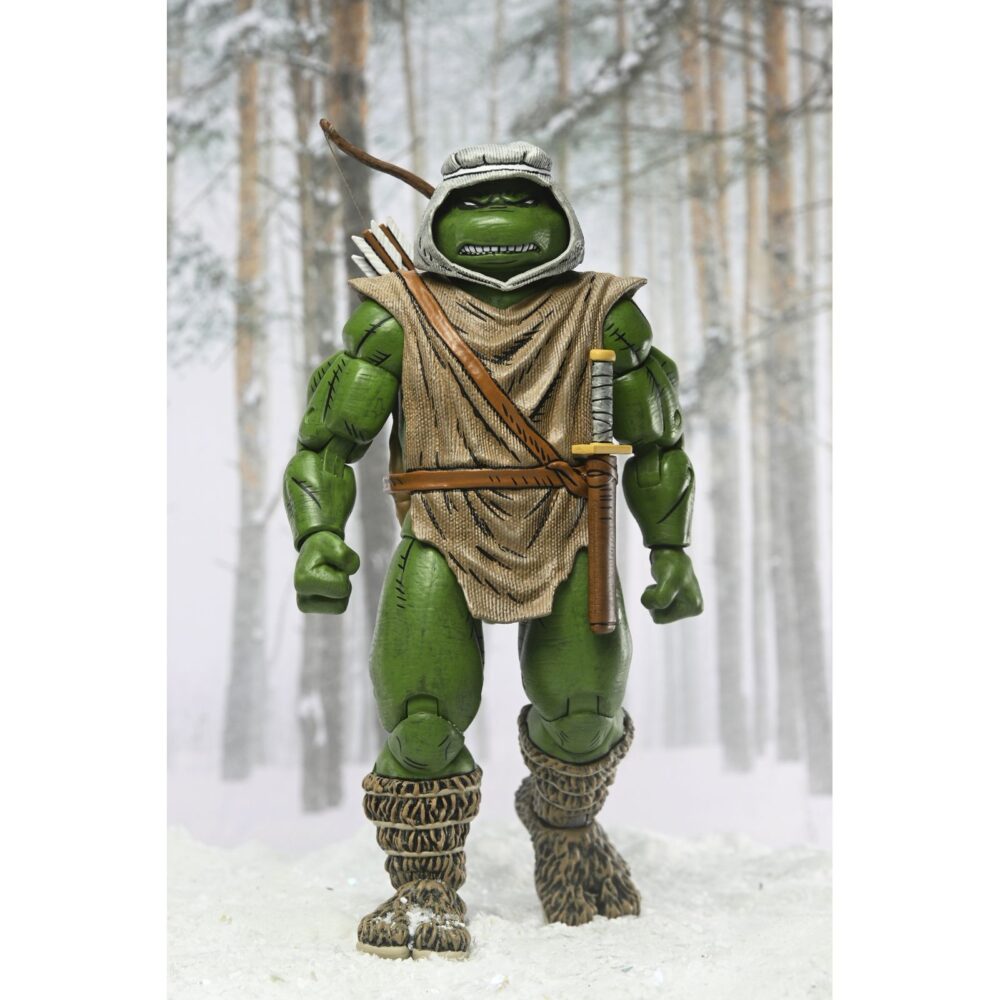 Hunter leo teenage mutant ninja turtles mirage comics. Neca presenta la figura articulada hunter leo basada en los cómics originales de "teenage mutant ninja turtles"  de mirage studios. Esta figura mide 18 cm e incluye 1x arco, 1x carcaj para sus armas, 3x flechas, 1x espada, 4x manos intercambiables y 1x cuchillo. Se presenta en una caja con ventana con ilustraciones de kevin eastman.