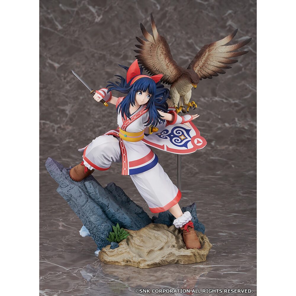 Nakoruru samurai spirits 1/7. Proof presenta la estatua de nakoruru basada en dicha luchadora de la saga "samurai shodown", concretamente en el aspecto que luce en el videojuego de 2019. Tiene una altura de 29,5 cm a escala 1/7. La guerrera kamubi se muestra blandiendo su espada, chichi-ushi, sobre una base rocosa junto a su compañero halcón mamahaha. Está fabricada en pvc y abs.