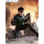 YU OMNIAE SPRIGGAN TENITOL. Furyu incorpora a su línea Tenitol la figura de Yu Ominae, protagonista del anime "Spriggan". Destaca por una pose dinámica y por su musculatura detallada que refleja con precisión las fibras y relieves del cuerpo. El traje A-M presenta arrugas realistas que refuerzan el efecto tridimensional y transmiten una fuerte presencia visual. La figura está pintada, fabricada en PVC y se presenta completamente montada. Mide aproximadamente 13,5 cm de alto e incluye base para su exposición.