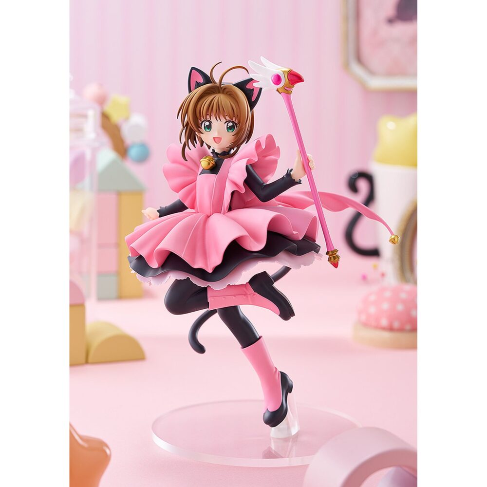 SAKURA KINOMOTO: BLACK CAT COSTUME CARDCAPTOR SAKURA POP UP PARADE L. Good Smile Company introduce en la línea Pop Up Parade L la figura de Sakura Kinomoto con disfraz de gato negro, inspirada en su personaje del anime "Cardcaptor Sakura". Esta figura de unos 22 cm combina una presencia impactante con la accesibilidad de la colección, e incluye base circular transparente para exposición.