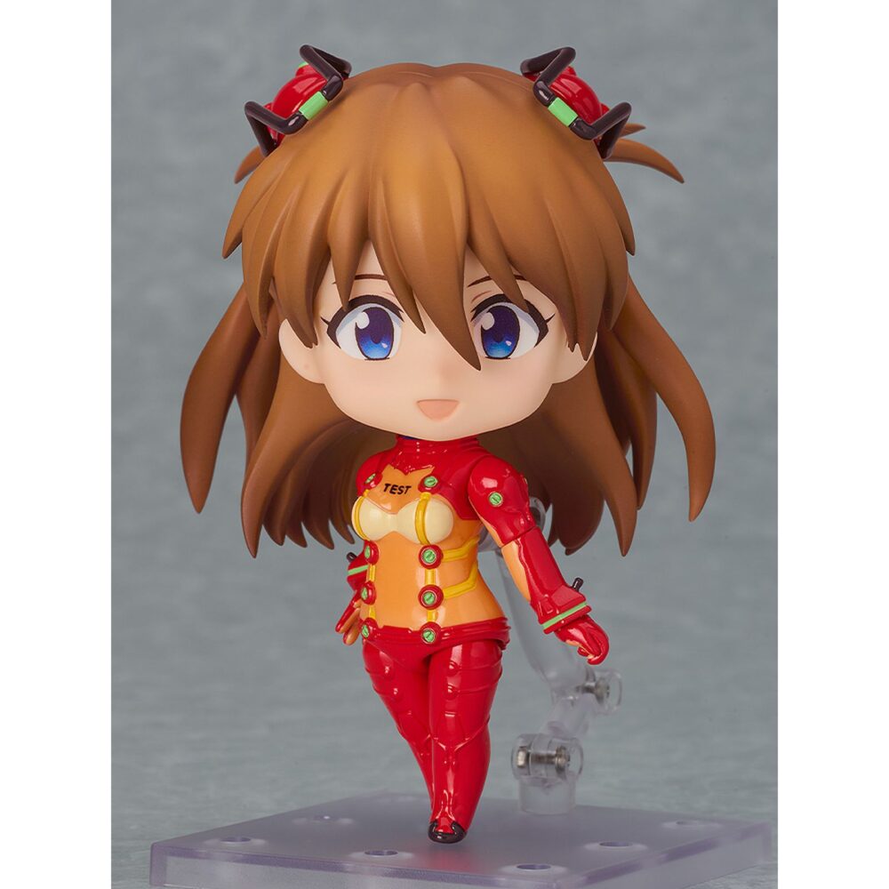 Shikinami asuka langley plugsuit version evangelion 2. 0 you can not advence nendoroid. Good smile presenta la figura articulada nendoroid de asuka shikinami langley con su traje de pruebas, inspirada en la película de animación "evangelion: 2. 0 you can (not) advance" (perteneciente a la tetralogía "rebuild of evangelion"). Incluye: 3x placas faciales intercambiables (sonrojada, guiñando un ojo y sonriente),1x teléfono móvil y otras piezas opcionales para diferentes poses. Mide aproximadamente 10 cm de alto y viene con base expositora transparente incluida.