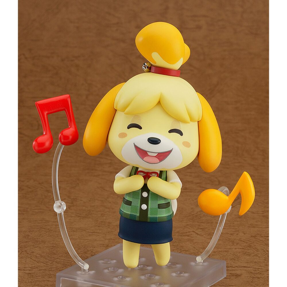 Isabelle figura 10 cm animal crossing: new leaf nendoroid re-run. Good smile company vuelve a presentar dentro de su línea nendoroid la figura de 10 cm de isabelle (o canela en españa), inspirada en el personaje del videojuego para nintendo 3ds "animal crossing: new leaf". Cuenta con sus característicos cascabeles como adorno de pelo que emite el icónico sonido del juego. Incluye 1x base con soporte transparente, 1x portapapeles con bolígrafo, 1x conjunto de notas musicales, 3x expresiones faciales (normal, contenta y preocupada) y 1x pieza con signo de interrogación para colocarla sobre su cabeza y recrear la pose del videojuego "¿necesitas algo? ".
