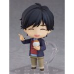 EIJI OKUMARA BANANA FISH NENDOROID. Orange Rouge reintroduce en su colección Nendoroid la figura de de Eiji Okumura, el estudiante universitario y asistente de cámara de la serie anime "Banana Fish". Esta figura articulada de unos 10 cm incluye 3x placas faciales (expresión estándar, sonriente y haciendo pucheros). Entre los accesorios incluidos se encuentran 1x bolso, 1x ración de arroz y 1x par de palillos. Viene con base transparente para exposición.