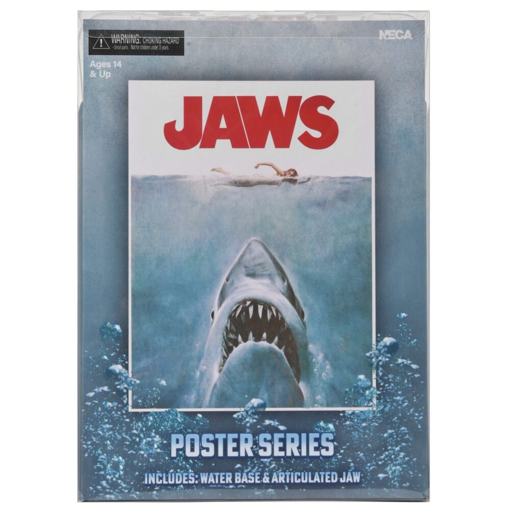 Jaws 50th anniversary poster series display. Con motivo del 50 aniversario de su estreno, neca presenta este diorama que reproduce el icónico póster pintado por roger kastel de la película de 1975 “jaws” (“tiburón” en españa). El tiburón del diorama cuenta con una mandíbula articulada y emerge de una base que imita el agua con burbujas esculpidas para atacar a la indefensa bañista de la superficie. Se presenta en una caja con ventana transparente y con con un fondo que recrea el póster clásico.