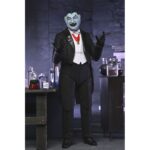 ULTIMATE GRANDPA MUNSTER THE MUNSTERS. Neca incorpora a su colección Ultimate Scale Action esta figura articulada del abuelo Munster basada en el personaja de la serie de televisión de los años 60 “The Munsters” ("La familia Monster" en España). Mide aproximadamente 18 cm y cuenta con un diseño detallado que captura el encanto travieso del personaje interpretado por Al Lewis. Incluye 1x capa de tela, 2x cabezas intercambiables, 5x manos adicionales, 1x pala y 3x vitrales diferentes. Se presenta en una caja con ventana y solapa frontal.