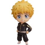 TAKEMICHI HANAGAKI TOKYO REVENGERS NENDOROID. Orange Rouge presenta, dentro de su colección Nendoroid, la figura de Takemichi Hanagaki, protagonista del anime "Tokyo Revengers". Esta figura articulada de 10 cm incluye 3x placas faciales (sonriente, de combate y llorando), 1x bolsa de patatas y otros complementos para múltiples poses. También incluye 1x tarta de cumpleaños para celebrar el 5º aniversario del anime, el 10º de la creación de Orange Rouge y propio cumpleaños del personaje. Viene con base transparente para exposición.