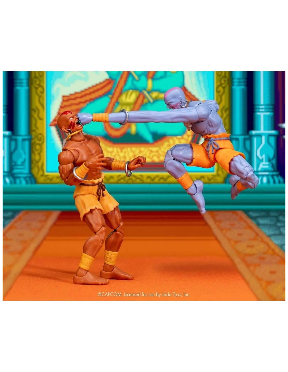 Dhalsim deluxe player 2 exclusive ultra street fighter ii. Jada toys presenta esta figura de dhalsim. Mide 17 cm y está basada en su aparición en los videojuegos de "street fighter". Fabricada por expertos a escala 1:12, esta figura da vida al maestro del yoga con una articulación increíble, extremidades flexibles únicas y efectos de fuego. Tanto si adopta una postura meditativa como si despliega su devastadora llama del yoga, esta versión de dhalsim es imprescindible para los coleccionistas serios de street fighter. Este set de lujo incluye todo lo necesario para encarnar su trascendental estilo de combate: (3) esculturas de cabeza en total, incluyendo una nueva expresión exclusiva para este lanzamiento, (1) escultura de cabeza extra para tu dhalsim jugador 1, (3) juegos de manos, (2) piernas flexibles, (2) brazos flexibles, accesorio de cuerpo en llamas con soporte de exhibición, (1) pieza de efecto yoga fuego y (1) pieza de efecto yoga llama. Esta figura de dhalsim se presenta en una caja de coleccionista con un escaparate transparente y es ideal tanto para los coleccionistas que la reciben dentro de la caja como para los que la sacan de ella. El embalaje también incluye una funda extraíble adornada con vibrantes ilustraciones de los personajes, lo que la convierte en una pieza destacada para cualquier exposición de street fighter. Unidades limitadas.