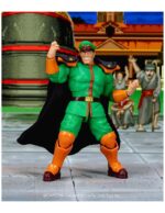 M BISON DELUXE PLAYER 2 EXCLUSIVE ULTRA STREET FIGHTER II. Jada Toys presenta la figura de Bison. Tiene una altura de 17 cm y está basada en el personaje de los videojuegos "Street Fighter". Incluye 3x cabezas extras, 2x pares de manos, 1x efecto de agua, 2x efectos de fuego y 1x base con soporte articulado. Adéntrate en el mundo de la dominación definitiva con la figura de acción a escala 1:12 de M. Bison (Exclusiva de Jugador 2 Deluxe) de Ultra Street Fighter II de Jada Toys. Con su color Verde Jugador 2, esta versión exclusiva del despiadado líder de Shadaloo aporta una nueva amenaza y una energía electrizante al combate. Ya sea desatando su Psycho Power o flotando amenazante sobre sus enemigos, M. Bison es la encarnación de la maldad pura e implacable. Este set premium está repleto de accesorios potentes: (4) esculturas de cabeza completas, incluyendo dos expresiones totalmente nuevas exclusivas de este lanzamiento, (2) esculturas de cabeza adicionales para tu M. Bison Jugador 1, (3) pares de manos, accesorio de cuerpo en llamas con base de exhibición, pieza de efecto Psycho Crusher, pieza de efecto Psycho Power y base. UNIDADES LIMITADAS.