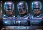 ROBOCOP 2 MOVIE MASTERPIECE HOT TOYS 1/6. Es considerada una película clásica de acción y ciencia ficción, muy querida por muchos fans. La historia sigue a RoboCop, un agente de la ley cíborg que antes era un humano llamado Alex Murphy. Tras ser brutalmente asesinado en acto de servicio, se transforma en un poderoso robot de alta tecnología con habilidades avanzadas. Posee superfuerza, visión mejorada y un compromiso inquebrantable con la ley. En "RoboCop 2", RoboCop continúa protegiendo a los ciudadanos de Detroit. Se enfrenta a una nueva amenaza cuando un ejecutivo rebelde de OCP desarrolla una versión más avanzada y malévola de RoboCop, lo que supone un grave desafío para su misión y la seguridad de la ciudad.