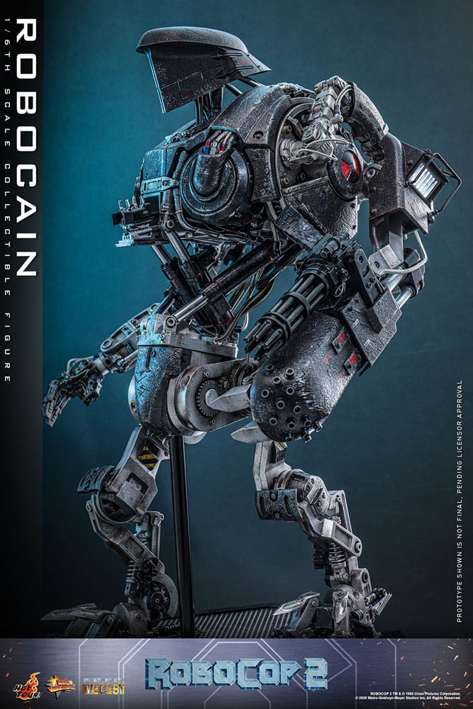 ROBOCAIN ROBOCOP 2 MOVIE MASTERPIECE HOT TOYS 1/6. “RoboCop” es un clásico de la película de acción y ciencia ficción, adorado por fans de todo el mundo. Si bien el propio RoboCop es icónico, los villanos de la película dejan una huella imborrable. En RoboCop 2, RoboCain emerge como un formidable cíborg que alberga el cerebro del difunto capo de la droga, Caín. Esta feroz bestia mecánica está fuertemente armada con potentes armas y tecnología de vanguardia, lo que la hace casi invencible en combate y representa un gran desafío para las fuerzas del orden. Sideshow y Hot Toys se complacen en dar vida a este villano robot con una impresionante figura coleccionable de RoboCain a escala 1/6.