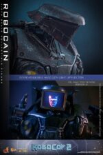 ROBOCAIN ROBOCOP 2 MOVIE MASTERPIECE HOT TOYS 1/6. “RoboCop” es un clásico de la película de acción y ciencia ficción, adorado por fans de todo el mundo. Si bien el propio RoboCop es icónico, los villanos de la película dejan una huella imborrable. En RoboCop 2, RoboCain emerge como un formidable cíborg que alberga el cerebro del difunto capo de la droga, Caín. Esta feroz bestia mecánica está fuertemente armada con potentes armas y tecnología de vanguardia, lo que la hace casi invencible en combate y representa un gran desafío para las fuerzas del orden. Sideshow y Hot Toys se complacen en dar vida a este villano robot con una impresionante figura coleccionable de RoboCain a escala 1/6.