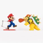 BOWSER SUPER MARIO SH FIGUARTS. Tamashii vuelve a presentar esta figura de Bowser, dentro de la colección S.H. Figuarts inspirada en "Super Mario Bros". Mide aproximadamente 13 cm y cuenta con múltiples puntos de articulación para exhibirlo en poses imponentes. Incluye 2x mandíbulas inferiores intercambiables, 2x manos adicionales y 1x soporte con su logotipo. Fabricada en ABS/PVC.