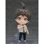 HAJIME HINATA DANGANRONPA 1-2 RELOAD NENDODOID. Good Smile incorpora a su colección Nendoroid la figura de Hajime Hinata, el estudiante que aparece en el videojuego "Danganronpa 1&2 Reload". Mide aproximadamente 10 cm e incluye 3x placas faciales intercambiables (sonriente, acusador y asustado), 1x lámina de contador y otras partes opcionales para poses. Cuenta con base cuadrada transparente y soporte para su exposición.