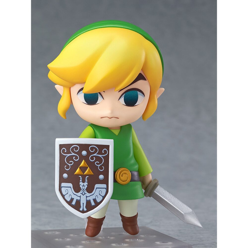 Link the legeng of zelda the wind waker nendoroid. Good smile company vuelve a incorporar a su colección nendoroid la figura articulada de link basada en el protagonista del videojuego "the legend of zelda: the wind waker hd" para nintendo wii u. La figura incluye 4x placas faciales intercambiables (seria, sonriente, combate y nervioso), 1x batuta, 1x escudo, 1x espada, 1x efecto de ataque y 1x contenedor de corazón con soporte. Mide aproximadamente 10 cm de altura y cuenta con una base cuadrada transparente con soporte para su exposición.