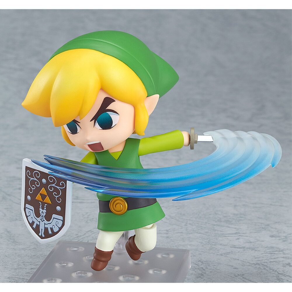 Link the legeng of zelda the wind waker nendoroid. Good smile company vuelve a incorporar a su colección nendoroid la figura articulada de link basada en el protagonista del videojuego "the legend of zelda: the wind waker hd" para nintendo wii u. La figura incluye 4x placas faciales intercambiables (seria, sonriente, combate y nervioso), 1x batuta, 1x escudo, 1x espada, 1x efecto de ataque y 1x contenedor de corazón con soporte. Mide aproximadamente 10 cm de altura y cuenta con una base cuadrada transparente con soporte para su exposición.