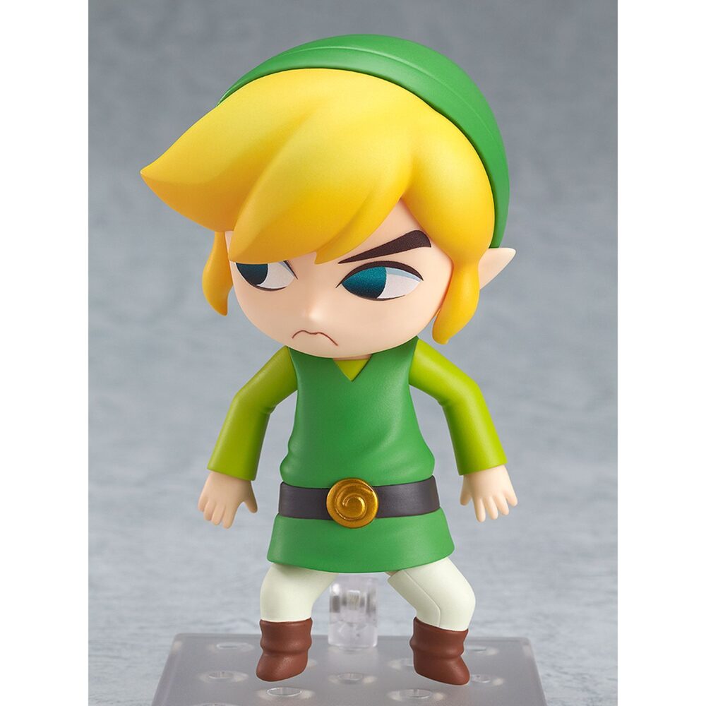 Link the legeng of zelda the wind waker nendoroid. Good smile company vuelve a incorporar a su colección nendoroid la figura articulada de link basada en el protagonista del videojuego "the legend of zelda: the wind waker hd" para nintendo wii u. La figura incluye 4x placas faciales intercambiables (seria, sonriente, combate y nervioso), 1x batuta, 1x escudo, 1x espada, 1x efecto de ataque y 1x contenedor de corazón con soporte. Mide aproximadamente 10 cm de altura y cuenta con una base cuadrada transparente con soporte para su exposición.