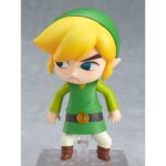 LINK THE LEGENG OF ZELDA THE WIND WAKER NENDOROID. Good Smile Company vuelve a incorporar a su colección Nendoroid la figura articulada de Link basada en el protagonista del videojuego "The Legend of Zelda: The Wind Waker HD" para Nintendo Wii U. La figura incluye 4x placas faciales intercambiables (seria, sonriente, combate y nervioso), 1x batuta, 1x escudo, 1x espada, 1x efecto de ataque y 1x contenedor de corazón con soporte. Mide aproximadamente 10 cm de altura y cuenta con una base cuadrada transparente con soporte para su exposición.