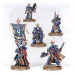 COMBAT PATROL: IMPERIAL FISTS WARHAMMER 40000. Los Puños Imperiales son conocidos por su estoica determinación y su dominio de la guerra de asedio, y por construir bastiones impenetrables. Prefieren el blindaje pesado y las líneas eficientes, negándose a ceder un milímetro de terreno por fuerte que sea la presión del enemigo. Si quieres defender con estoicismo el Imperium, esta caja es perfecta para empezar o ampliar una colección de Puños Imperiales de forma más económica que comprando los kits por separado. Liderados por un heroico Capitán y su escuadra de élite de Héroes de la Compañía, los Intercesores Pesados y los Exterminadores atraviesan el fuego enemigo más intenso. Una escuadra de Intercesores despacha cualquier resistencia que quede y toma objetivos clave. Estas 21 miniaturas de plástico representan una fuerza completa de Puños Imperiales para usar en disputadas partidas tácticas del formato Patrulla de Warhammer 40,000. Puedes descargar de forma gratuita las reglas de esta Patrulla del sitio web de Warhammer Community.
