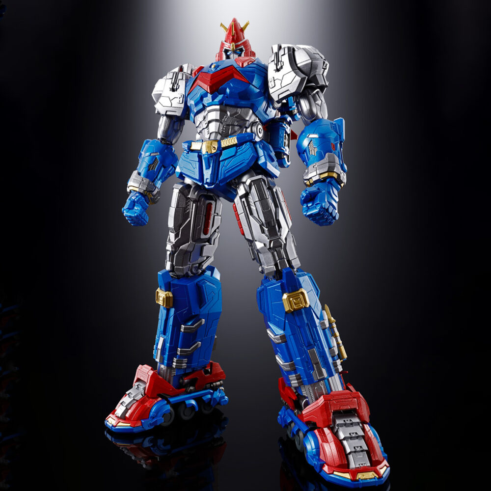 GX-118 VOLTES V LEGACY SOUL OF CHOGOKIN. Tamashii Nations presenta dentro de su línea Soul Of Chogokin la figura de Voltes V basada en su aparición en la serie de televisión "Voltes V: Legacy" que recrea el anime clásico "Super Electromagnetic Machine Voltes V". Esta figura se ha diseñado según el aspecto de la serie y recreándola con la calidad habitual de esta colección. Está fabricada con ABS, PVC y una aleación metálica. Tiene una altura total aproximada de 24 cm y se forma por la combinación de 5x vehículos: Volt Cruiser, Volt Bomber y Volt Panzer como torso, Volt Frigate como cintura y piernas y Volt Lander completa la figura como pies. Cuenta con mecanismos móviles en su estado combinado que le permite asumir una gran variedad de poses. Incluye diversos accesorios adicionales como 4x pares de manos intercambiables, 1x espada Heaven, 2x cadenas ultra electromagnéticas (fabricadas con material flexible), 2x peonzas con cuchillas acoplables a la punta de las cadenas y piezas adicionales que permiten sujetar armas con ambas manos cuando se acopla el Voltes Bazooka como brazo. Además, gracias a las partes en ángulo de las muñecas puede posar con la espada Heaven alzada o hacia abajo. También se incluye un 1x set completo de piezas para el modo Tanque y 1x pedestal para exponer tanto la figura completada como los cinco vehículos que la componen por separado. UNIDADES LIMITADAS.