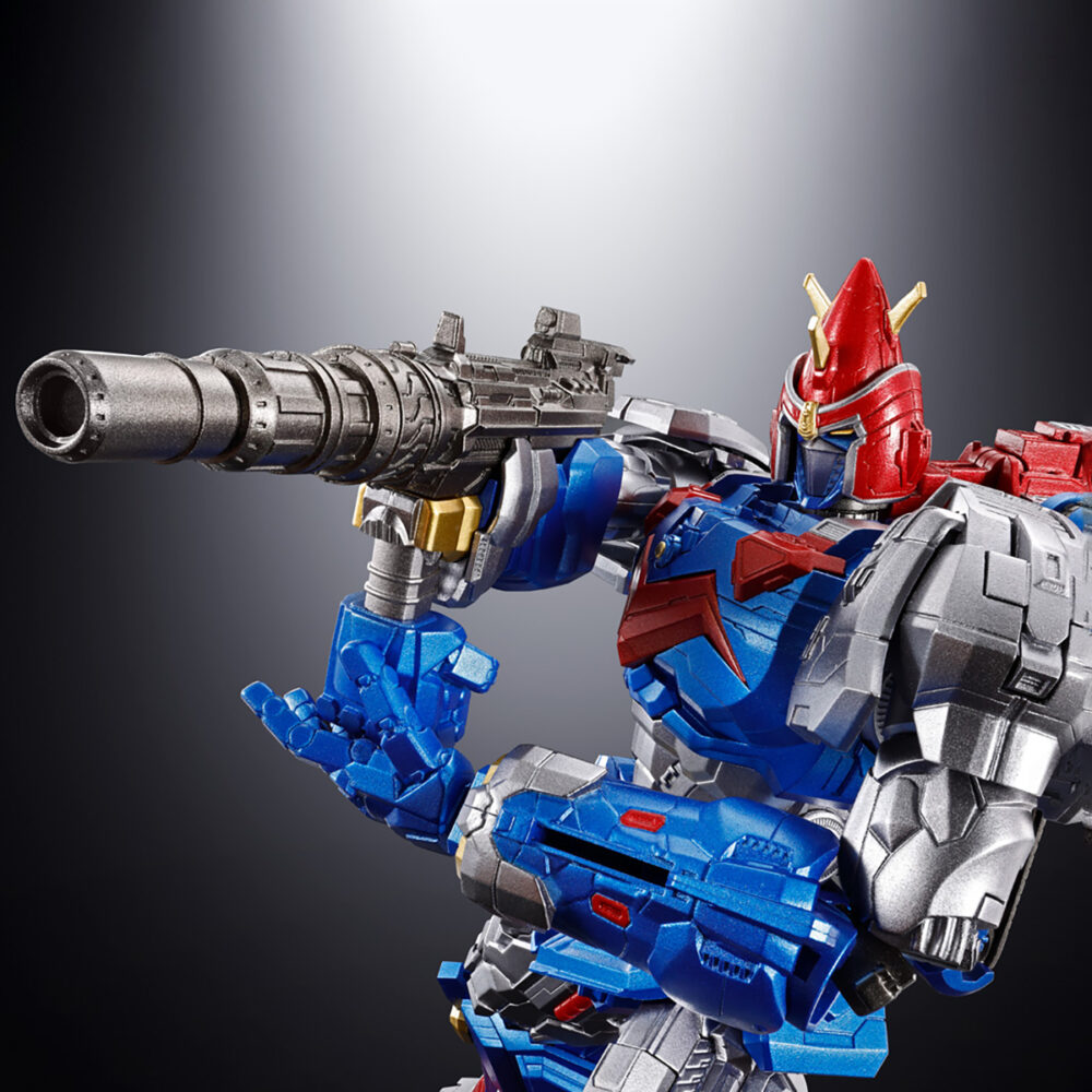Gx-118 voltes v legacy soul of chogokin. Tamashii nations presenta dentro de su línea soul of chogokin la figura de voltes v basada en su aparición en la serie de televisión "voltes v: legacy" que recrea el anime clásico "super electromagnetic machine voltes v". Esta figura se ha diseñado según el aspecto de la serie y recreándola con la calidad habitual de esta colección. Está fabricada con abs, pvc y una aleación metálica. Tiene una altura total aproximada de 24 cm y se forma por la combinación de 5x vehículos: volt cruiser, volt bomber y volt panzer como torso, volt frigate como cintura y piernas y volt lander completa la figura como pies. Cuenta con mecanismos móviles en su estado combinado que le permite asumir una gran variedad de poses. Incluye diversos accesorios adicionales como 4x pares de manos intercambiables, 1x espada heaven, 2x cadenas ultra electromagnéticas (fabricadas con material flexible), 2x peonzas con cuchillas acoplables a la punta de las cadenas y piezas adicionales que permiten sujetar armas con ambas manos cuando se acopla el voltes bazooka como brazo. Además, gracias a las partes en ángulo de las muñecas puede posar con la espada heaven alzada o hacia abajo. También se incluye un 1x set completo de piezas para el modo tanque y 1x pedestal para exponer tanto la figura completada como los cinco vehículos que la componen por separado. Unidades limitadas.