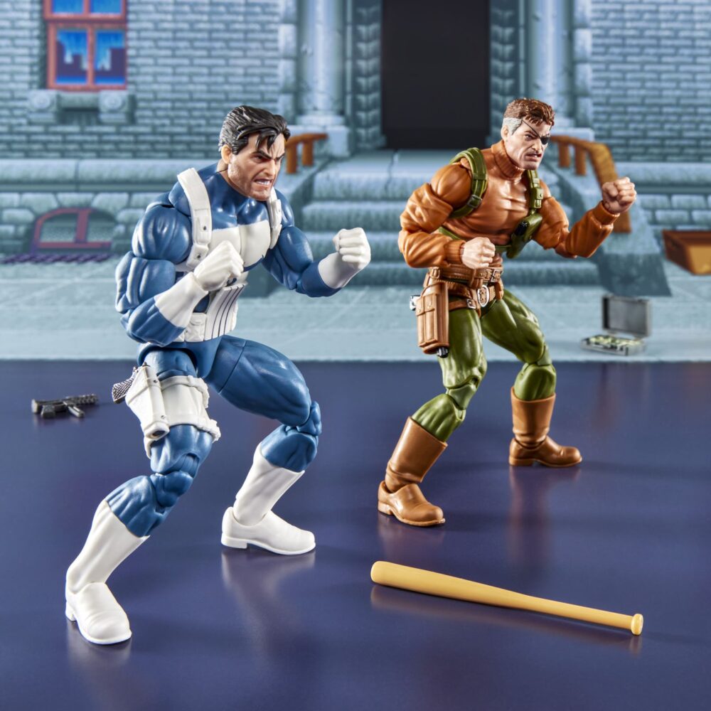 Punisher y nick fury the punisher gamerverse marvel legends series. Hasbro suma a la colección marvel legends series este pack de dos figuras articuladas de punisher y nick fury, tal y como aparecen en el clásico videojuego "the punisher". Cada figura mide aproximadamente 15 cm y está fabricada en abs de alta calidad, con múltiples puntos de articulación para recrear poses dinámicas. Incluye: 1x cabeza alternativa de punisher y 4x manos intercambiables para cada uno de los personajes, 1x bate, 1x maletín con dinero, 1x granada, 6x armas de fuego variadas y 1 x efecto de explosión. Se presenta en una caja ilustrada de edición especial. Unidades limitadas.