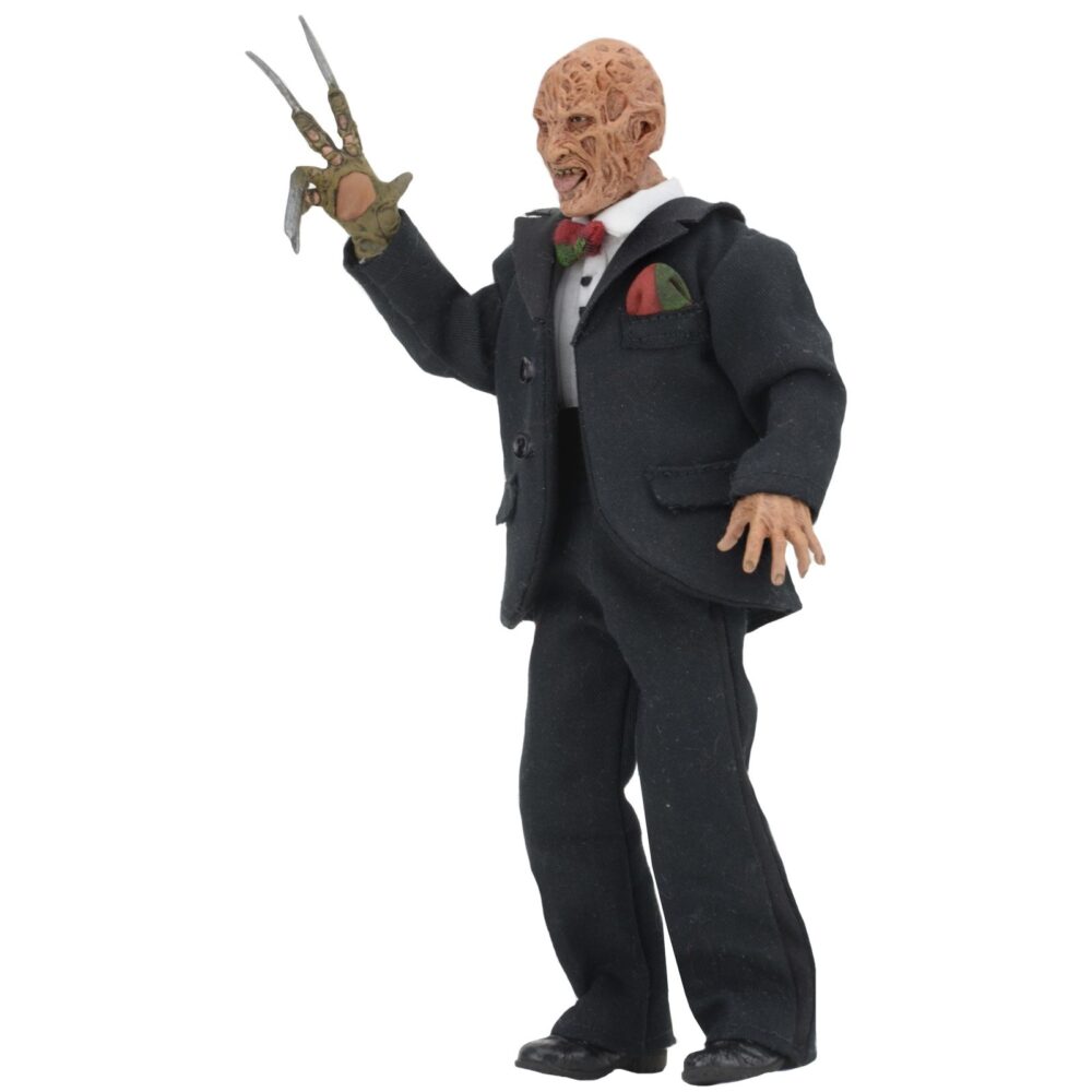 Freddy tuxedo nightmare in elm street 3 re-run. Neca vuelve a presentar a freddy krueger con esmoquin inspirado en la película "a nightmare on elm street 3: dream warriors" ("pesadilla en elm street 3: los guerreros del sueño" en españa). Esta figura vestida mide 20 cm y lleva un traje de tela con pajarita a rayas rojas y verdes. Incluye 1x réplica de la casa nº 1428 de elm street con luz led. Se entrega en una caja con ventana apta para coleccionistas.