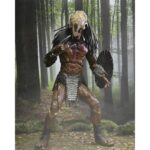 ULTIMATE FERAL PREDATOR PREY. Neca vuelve a presentar la figura Ultimate del Predator que aparece en la película "Prey", ambientada hace 300 años. Este depredador alienígena altamente evolucionado mide más de 20 cm de alto y reproduce con precisión su aspecto en la película. Incluye 1x máscara, 1x arpón, 2x lanzas (cerrada y desplegada), 2x escudos (abierto y plegado), 2x mandíbulas, armas adicionales y 7x manos intercambiables. Se entrega en una caja con solapa frontal apta para exhibición.