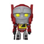 BLASTER TRANSFORMERS: RETRO SERIES FUNKO POP. Figura de vinilo de la línea 'POP!', tamaño aprox. 9 cm. Vive la nostalgia con la Figura de Vinilo Blaster de la Transformers Retro Series POP! TV. Con un diseño compacto de aproximadamente 9 cm, esta figura captura la esencia clásica del personaje Blaster, famoso por su papel en la serie Transformers. Fabricada por Funko, esta figura presenta un acabado en vinilo de alta calidad que resalta sus vibrantes colores rojo y gris, junto con detalles precisos como sus ojos amarillos brillantes y emblemas característicos. Sus dimensiones de 11,6 x 16,4 x 9,2 cm y un peso ligero de 155 gramos, la hacen ideal para exhibirla en cualquier colección de figuras de acción. Perfecta para fans de todas las edades, esta figura es un complemento imprescindible para cualquier entusiasta de Transformers o coleccionista de figuras POP.