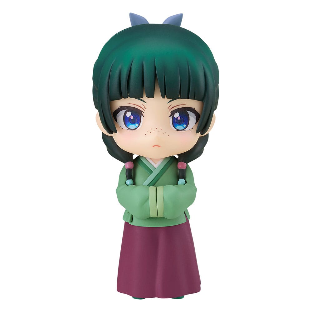 MAOMAO THE APOTHECARY DIARIES NENDOROID. MAOMAO THE APOTHECARY DIARIES NENDOROID. En el mundo de The Apothecary Diaries, Maomao es una joven boticaria brillante y perspicaz cuya ingenuidad la lleva al centro de las intrigas de la corte imperial. Curiosa y observadora, destaca por su capacidad para resolver misterios gracias a sus conocimientos médicos y su aguda perspicacia. Este entrañable personaje suele representarse con su personalidad franca y su mirada penetrante. Detrás de su aparente indiferencia se esconde una heroína dispuesta a enfrentarse incluso a las tramas más oscuras con calma y lógica. Esta figura captura sus múltiples facetas y su energía única. La Nendoroid la muestra con el pelo verde trenzado, los ojos azules brillantes y sus distintivas pecas. Lleva su tradicional traje verde y ciruela, fiel a la serie, y viene con varias caras intercambiables para recrear sus expresiones más icónicas, desde las serias hasta las cómicas. Los accesorios adicionales, como hierbas medicinales, un cuenco, un pez o incluso orejas de gato, aportan variedad y un encanto divertido. Fabricada en PVC y con una altura de unos 10 cm, esta figura destaca por sus finos detalles: los pliegues de su ropa, los sutiles matices de color y los pequeños accesorios están cuidadosamente reproducidos. Al igual que todas las Nendoroids, viene con una base articulada que permite múltiples opciones de posado, lo que te permite dar vida a sus aventuras.