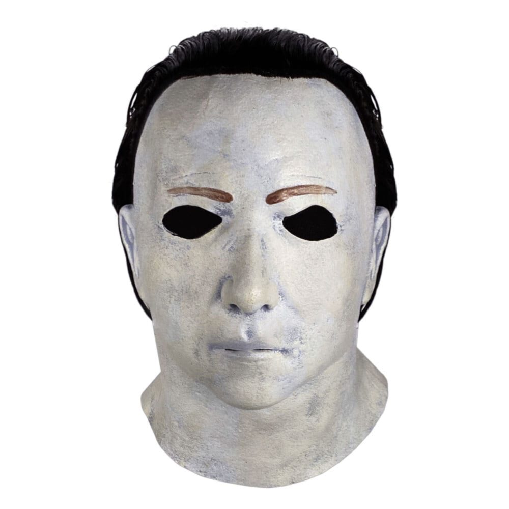 HALLOWEEN 5 MÁSCARA DE LÁTEX MICHAEL MYERS. Trick or Treat Studios se enorgullece de presentar la máscara oficial con licencia de Halloween 5: La venganza de Michael Myers - Michael Myers. Esta increíble réplica de la máscara que lleva Michael Myers en Halloween 5: La venganza de Michael Myers se ha esculpido a partir de numerosas capturas de pantalla y fotogramas de la película. Todo lo que se ve en la pantalla está representado en la máscara, incluido el accesorio para la nariz. ¡Hazte con la máscara oficial de Halloween 5: La venganza de Michael Myers - Michael Myers y celebra la venganza de Michael Myers! Material: látex con pelo natural y ojos de malla negra.