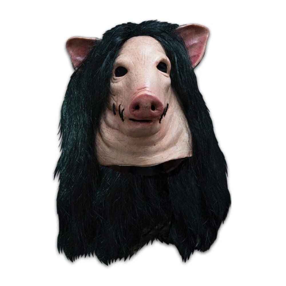 Saw máscara de látex pig.  trick or treat studios se enorgullece de presentar la máscara oficial con licencia de saw - pig mask. Esculpida por el artista que esculpió varios de los personajes de universal studios halloween horror nights - saw maze y utilizando innumerables capturas de pantalla. Cada detalle del increíble saw pig está representado en esta máscara, incluyendo una boca cosida con puntadas de hilo reales, una peluca de pelo largo negro de calidad profesional y una espalda empapada en sangre con huesos protuberantes.   máscara de cerdo para adultos de saw ¡conviértete en el aprendiz anónimo de jigsaw con esta máscara de cerdo de saw con licencia oficial! La detallada máscara de látex presenta la icónica boca con hilos y abertura en el hocico y los ojos. La parte delantera de la máscara es de color carne, con excelentes detalles de piel desgarrada y ensangrentada en la parte posterior. ¡el pelo sintético con ondas profundas está estratégicamente colocado en toda la parte superior de la máscara para una cobertura completa! El pelo mide 50 cm desde la parte superior de la máscara. La máscara mide 35 cm de delante a atrás, 25 cm de ancho y las orejas miden 10 cm desde la parte superior de la máscara. Se trata de una máscara de halloween saw pig con licencia oficial. Instrucciones de cuidado: guardar lejos de la luz solar directa, limpiar con una esponja húmeda, espolvorear con maicena o polvo sin talco, limpiar el polvo con un paño seco o un plumero, limpiar el pelo con un paño húmedo y peinarlo. No uses la máscara mientras conduces vehículos. No fumes, duermas ni te acerques a llamas abiertas mientras uses la máscara. Material: látex.