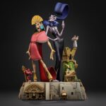 KUZKO & YZMA EL EMPERADOR Y SUS LOCURAS ESTATUA DELUXE ART SCALE 1/10. estatua oficial de resina, de unos 28 cm de altura reúne a Kuzco e Yzma en un único diorama con un aire muy teatral.